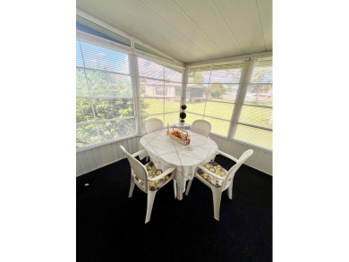 This beautiful two-bedroom, two-bath home is located in the on Pine Lakes Country Club in Florida - for sale on GolfHomes.com, golf home, golf lot