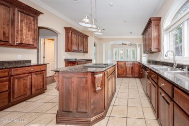 Welcome to your executive four-bedroom grand home located on the on The Oaks Golf Club in Mississippi - for sale on GolfHomes.com, golf home, golf lot