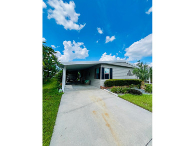 This beautiful two-bedroom, two-bath home is located in the on Pine Lakes Country Club in Florida - for sale on GolfHomes.com, golf home, golf lot