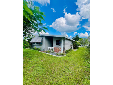 This beautiful two-bedroom, two-bath home is located in the on Pine Lakes Country Club in Florida - for sale on GolfHomes.com, golf home, golf lot