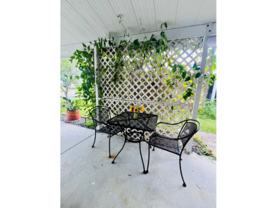 This beautiful two-bedroom, two-bath home is located in the on Pine Lakes Country Club in Florida - for sale on GolfHomes.com, golf home, golf lot
