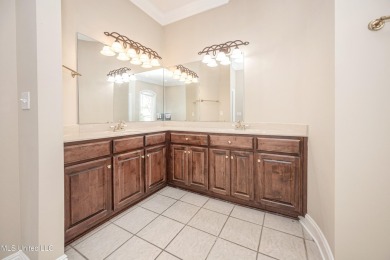 Welcome to your executive four-bedroom grand home located on the on The Oaks Golf Club in Mississippi - for sale on GolfHomes.com, golf home, golf lot