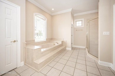 Welcome to your executive four-bedroom grand home located on the on The Oaks Golf Club in Mississippi - for sale on GolfHomes.com, golf home, golf lot