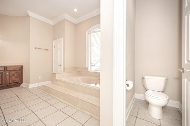 Welcome to your executive four-bedroom grand home located on the on The Oaks Golf Club in Mississippi - for sale on GolfHomes.com, golf home, golf lot