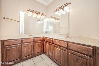 Welcome to your executive four-bedroom grand home located on the on The Oaks Golf Club in Mississippi - for sale on GolfHomes.com, golf home, golf lot
