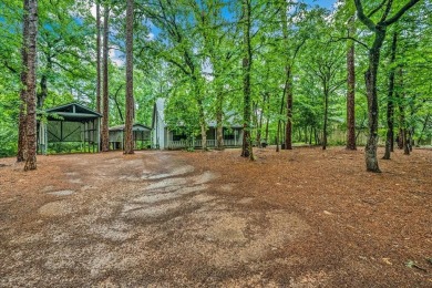 Adorable 3 bedroom home in tranquil wooded setting in highly on Holly Lake Ranch Golf Club in Texas - for sale on GolfHomes.com, golf home, golf lot