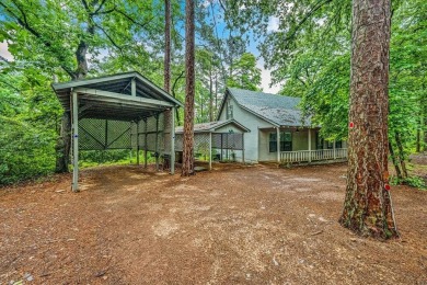 Adorable 3 bedroom home in tranquil wooded setting in highly on Holly Lake Ranch Golf Club in Texas - for sale on GolfHomes.com, golf home, golf lot