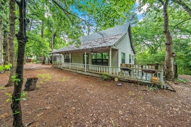 Adorable 3 bedroom home in tranquil wooded setting in highly on Holly Lake Ranch Golf Club in Texas - for sale on GolfHomes.com, golf home, golf lot