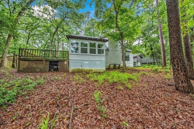 Adorable 3 bedroom home in tranquil wooded setting in highly on Holly Lake Ranch Golf Club in Texas - for sale on GolfHomes.com, golf home, golf lot