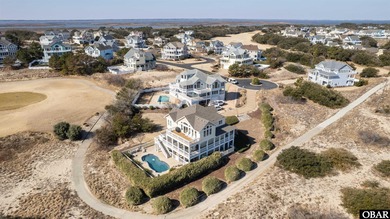Welcome to 670 High Sand Dune Court, located in the gated on The Currituck Golf Club in North Carolina - for sale on GolfHomes.com, golf home, golf lot
