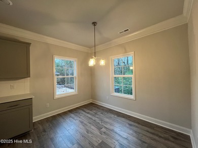 Ready now! Completed new home in Palmetto Creek. The 1709 plan on Lennon Hills Golf Course in North Carolina - for sale on GolfHomes.com, golf home, golf lot