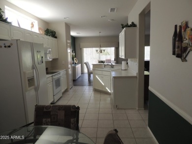 This home is located in ''The Grand'' community formerly known on Sun City Grand Golf Couse and Club in Arizona - for sale on GolfHomes.com, golf home, golf lot