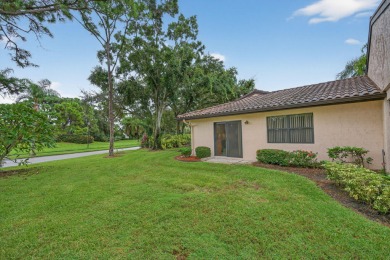 Welcome home to this beautifully updated single-story residence on Martin Downs Country Club in Florida - for sale on GolfHomes.com, golf home, golf lot