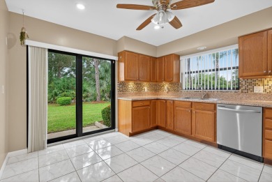 Welcome home to this beautifully updated single-story residence on Martin Downs Country Club in Florida - for sale on GolfHomes.com, golf home, golf lot