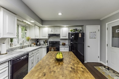 This inviting ranch-style home offers a great layout with a on Muncie Elks Country Club in Indiana - for sale on GolfHomes.com, golf home, golf lot