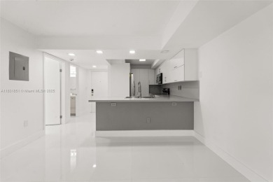 Resort-Style Living in the Heart of Doral. Light-filled  move-in on Jim McLean Signature Course in Florida - for sale on GolfHomes.com, golf home, golf lot