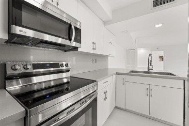 Resort-Style Living in the Heart of Doral. Light-filled  move-in on Jim McLean Signature Course in Florida - for sale on GolfHomes.com, golf home, golf lot