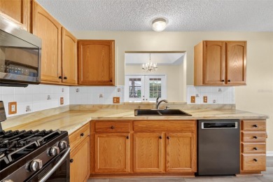 One or more photo(s) has been virtually staged. FANTASTIC 3/2 on The Links of Spruce Creek in Florida - for sale on GolfHomes.com, golf home, golf lot