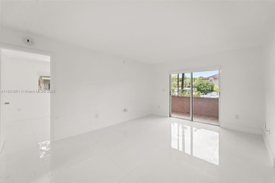 Resort-Style Living in the Heart of Doral. Light-filled  move-in on Jim McLean Signature Course in Florida - for sale on GolfHomes.com, golf home, golf lot