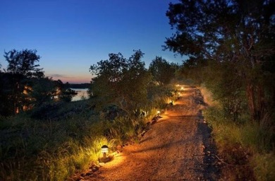 This lot has incredible views of the Texas hill country and is on Blue Lake Golf Club in Texas - for sale on GolfHomes.com, golf home, golf lot