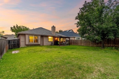 This lovely, improved single-story home is nestled within a on Woodbridge Golf Club in Texas - for sale on GolfHomes.com, golf home, golf lot