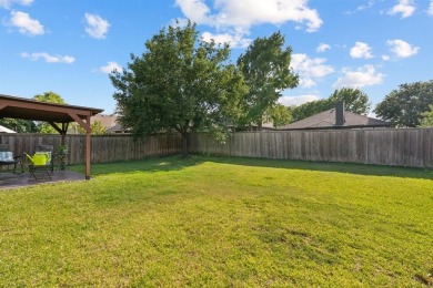 This lovely, improved single-story home is nestled within a on Woodbridge Golf Club in Texas - for sale on GolfHomes.com, golf home, golf lot
