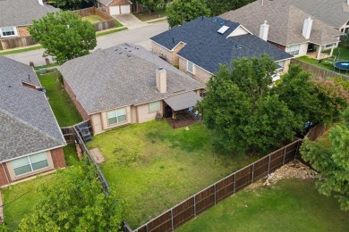 This lovely, improved single-story home is nestled within a on Woodbridge Golf Club in Texas - for sale on GolfHomes.com, golf home, golf lot