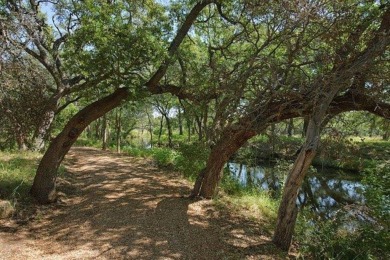 This lot has incredible views of the Texas hill country and is on Blue Lake Golf Club in Texas - for sale on GolfHomes.com, golf home, golf lot