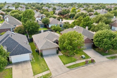 This lovely, improved single-story home is nestled within a on Woodbridge Golf Club in Texas - for sale on GolfHomes.com, golf home, golf lot