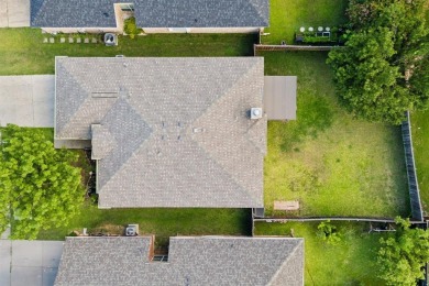 This lovely, improved single-story home is nestled within a on Woodbridge Golf Club in Texas - for sale on GolfHomes.com, golf home, golf lot