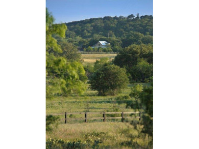 This lot has incredible views of the Texas hill country and is on Blue Lake Golf Club in Texas - for sale on GolfHomes.com, golf home, golf lot