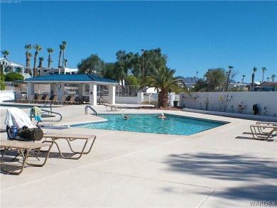 Lovely snowbird park model with a nice family room add on. Great on Riverview Golf Course in Arizona - for sale on GolfHomes.com, golf home, golf lot