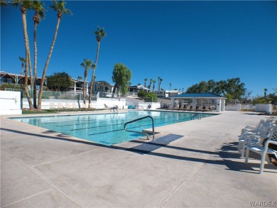 Lovely snowbird park model with a nice family room add on. Great on Riverview Golf Course in Arizona - for sale on GolfHomes.com, golf home, golf lot