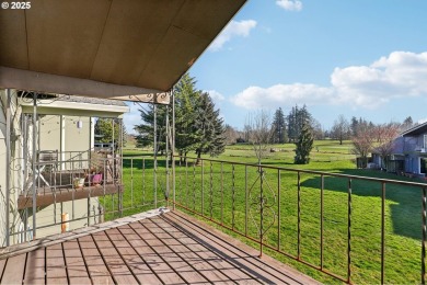 Golf course views from the patio or the deck in this updated on Gresham Golf Course in Oregon - for sale on GolfHomes.com, golf home, golf lot