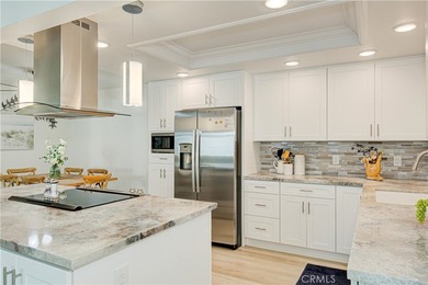 Beautifully remodeled ground level Casa Contenta with absolutely on Leisure Village Par 3 Golf Course in California - for sale on GolfHomes.com, golf home, golf lot