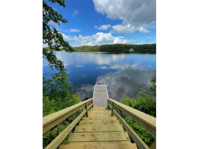 A Cozy 1 Bedroom, 1.5 bath with an additional sleeping area for on Wilson Lake Country Club in Maine - for sale on GolfHomes.com, golf home, golf lot