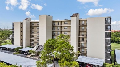 The view truly takes the cake in this stunning top-floor condo on Cove Cay Country Club in Florida - for sale on GolfHomes.com, golf home, golf lot