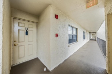 The view truly takes the cake in this stunning top-floor condo on Cove Cay Country Club in Florida - for sale on GolfHomes.com, golf home, golf lot
