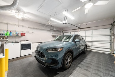 Step into your dream home with this unique and spacious 2 on Eagle Ridge At Spruce Creek Country Club in Florida - for sale on GolfHomes.com, golf home, golf lot