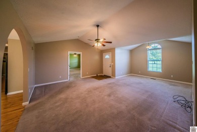 This welcoming 3-bedroom, 2-bath home sits on just over an acre on Paxton Park Golf Course in Kentucky - for sale on GolfHomes.com, golf home, golf lot