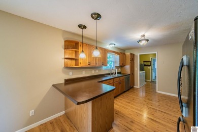 This welcoming 3-bedroom, 2-bath home sits on just over an acre on Paxton Park Golf Course in Kentucky - for sale on GolfHomes.com, golf home, golf lot