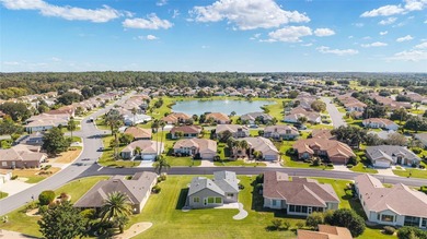 Step into your dream home with this unique and spacious 2 on Eagle Ridge At Spruce Creek Country Club in Florida - for sale on GolfHomes.com, golf home, golf lot