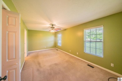 This welcoming 3-bedroom, 2-bath home sits on just over an acre on Paxton Park Golf Course in Kentucky - for sale on GolfHomes.com, golf home, golf lot