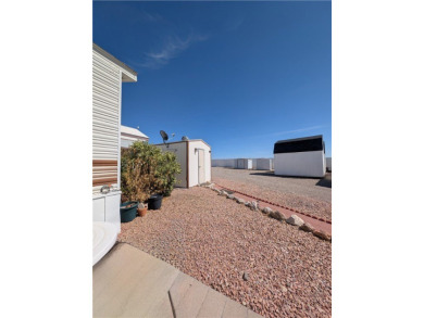Fabulous home. Covered parking. No one behind you which gives on Riverview Golf Course in Arizona - for sale on GolfHomes.com, golf home, golf lot