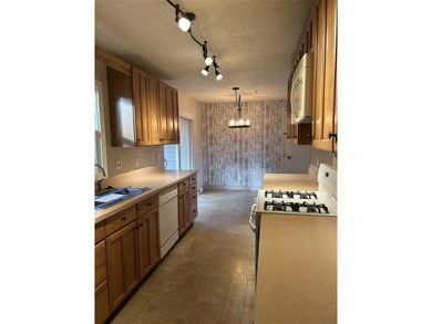 Own a home in one of the most highly sought-after neighborhoods on Olive Glenn Golf and Country Club in Wyoming - for sale on GolfHomes.com, golf home, golf lot