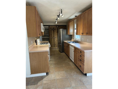 Own a home in one of the most highly sought-after neighborhoods on Olive Glenn Golf and Country Club in Wyoming - for sale on GolfHomes.com, golf home, golf lot