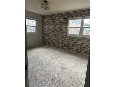 Own a home in one of the most highly sought-after neighborhoods on Olive Glenn Golf and Country Club in Wyoming - for sale on GolfHomes.com, golf home, golf lot