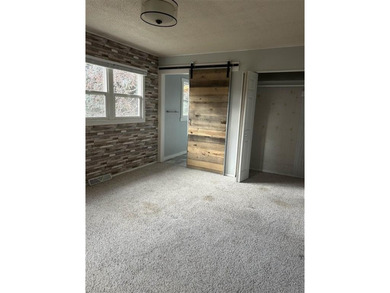 Own a home in one of the most highly sought-after neighborhoods on Olive Glenn Golf and Country Club in Wyoming - for sale on GolfHomes.com, golf home, golf lot