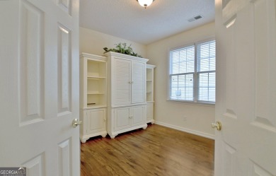 Almost 3000 heated square feet and backs up to the Golf Course on Summergrove Golf Club in Georgia - for sale on GolfHomes.com, golf home, golf lot