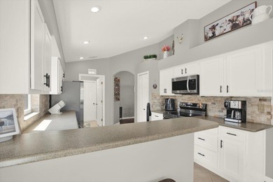 Golf course, pool home, extra large driveway, recent ROOF on Rivard Golf and Country Club in Florida - for sale on GolfHomes.com, golf home, golf lot